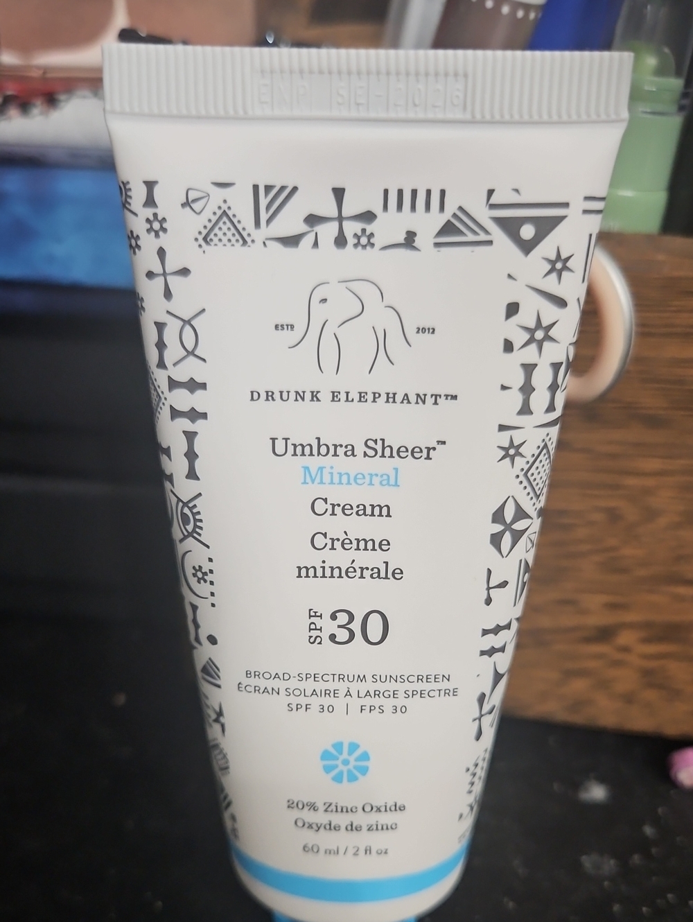 Drunk Elephant Umbra Sheer Mineral Cream SPF 30 — White with Blue Accents